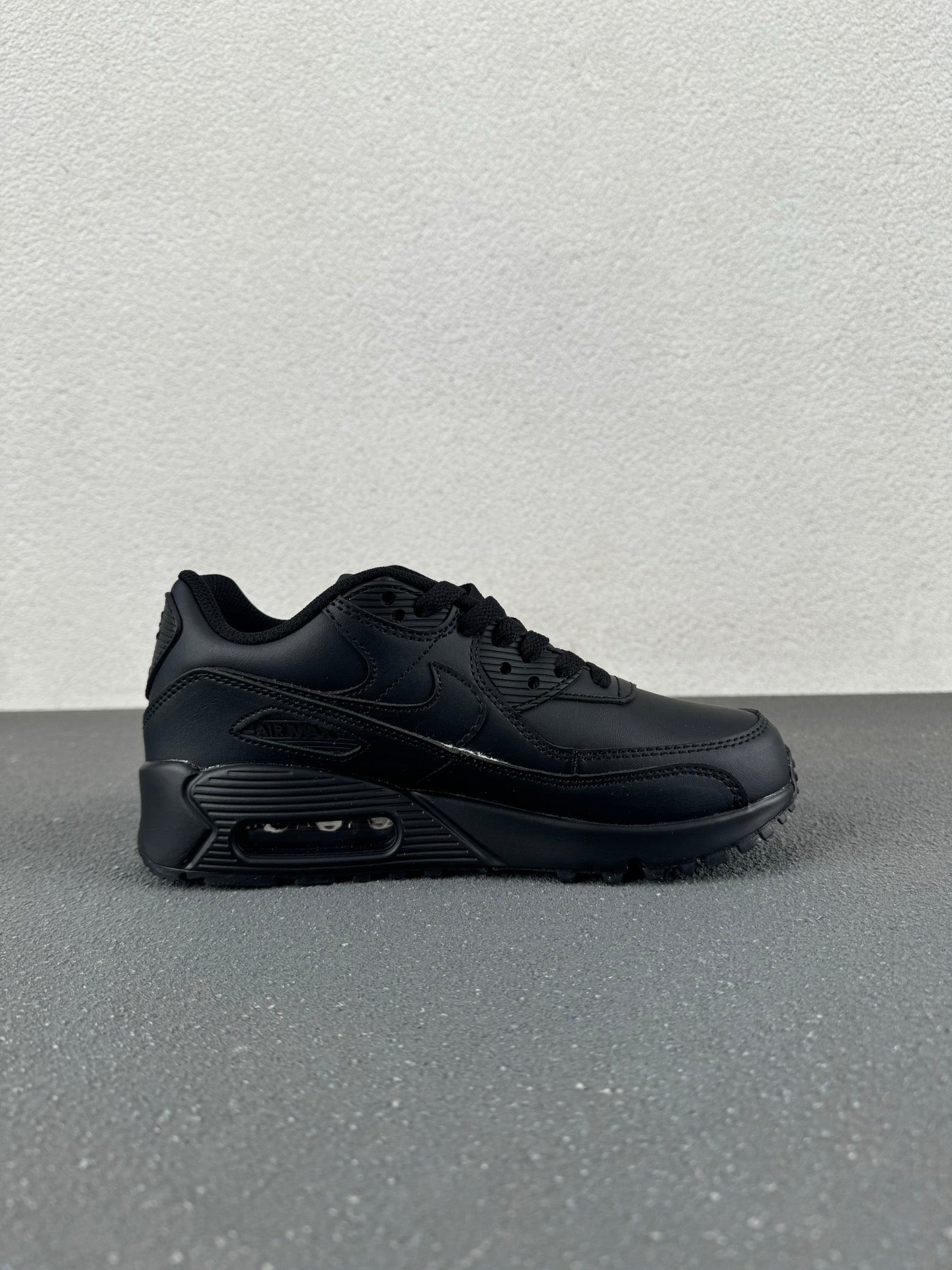 Nike Air Max 90 – Triple Black Leather Low-Top Sneaker