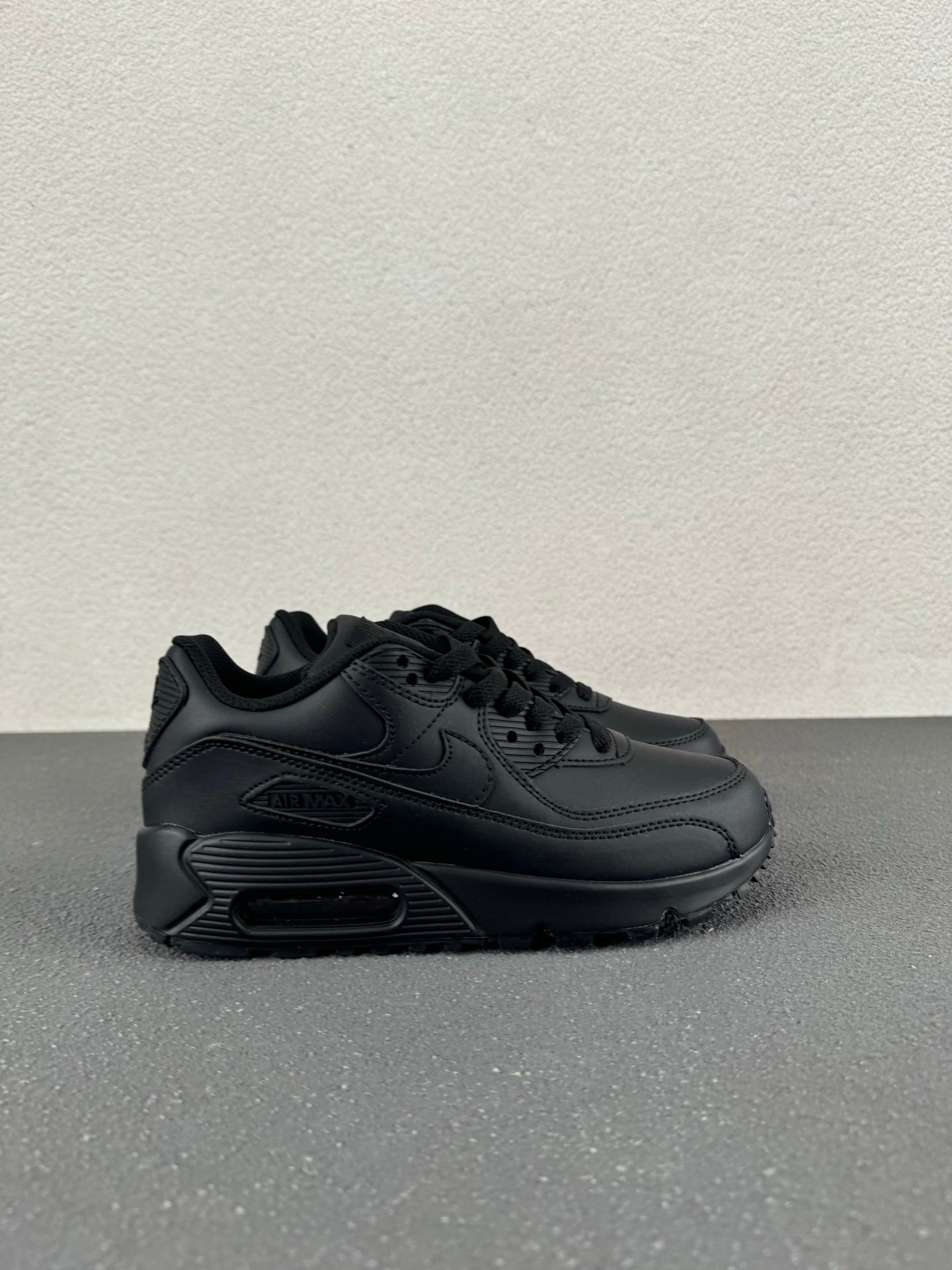 Nike Air Max 90 – Triple Black Leather Low-Top Sneaker