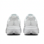 White Nike Pegasus sneakers with thick soles, rear view on white background