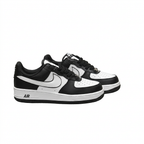 Pair of black and white Nike Air Force 1 low-top sneakers in a three-quarter view on white.