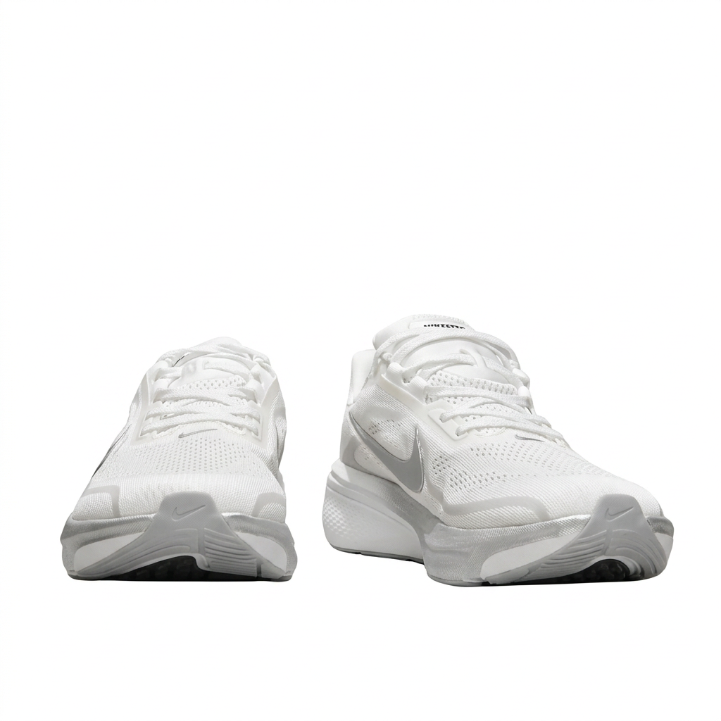 White Nike Pegasus sneakers with white laces, front view on white background