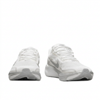 White Nike Pegasus sneakers with white laces, front view on white background