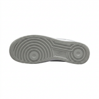 Grey Nike Air Force 1 outsole with circular tread on white background