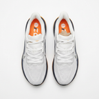 Top view of the white and navy Nike low-top sneakers