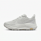 Light grey and white Nike ACG sneaker, side view on white background