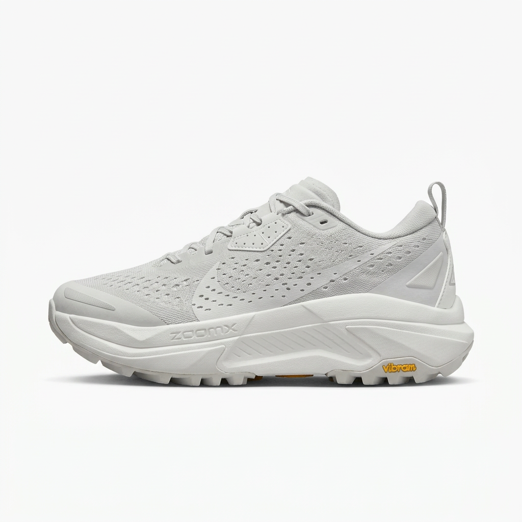 Light grey and white Nike ACG sneaker, side view on white background