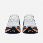 Front view of the white and navy Nike low-top sneakers