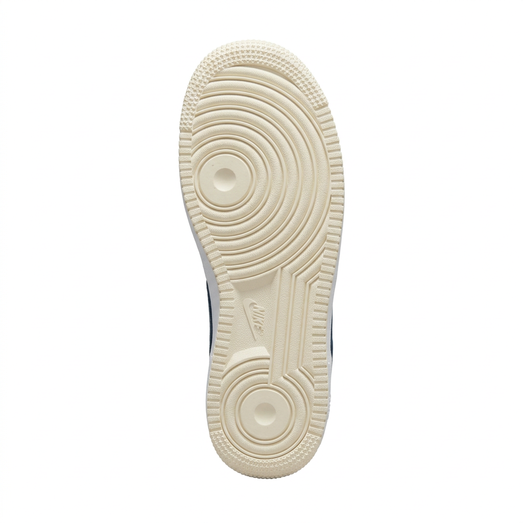 Cream Nike Air Force 1 outsole with circular tread on white background
