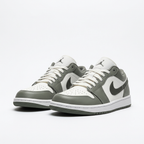 Front view of the grey and white Air Jordan 1 Low sneakers