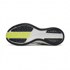 Black and white Nike sneaker outsole with a neon lime forefoot section on white.