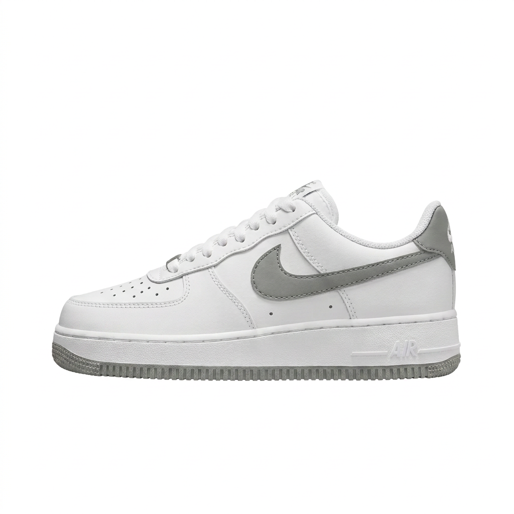 White Nike Air Force 1 sneaker with grey Swoosh and outsole, side view on white background