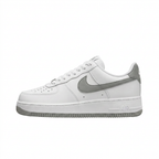 White Nike Air Force 1 sneaker with grey Swoosh and outsole, side view on white background