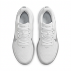 White Nike Pegasus sneakers with mesh uppers and silver-grey details, overhead view on white background