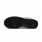 Black Nike Air Force 1 outsole with circular tread on a white background.