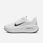 Nike ZoomX low-top sneaker in white with a black Swoosh, side view