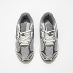 Silver grey Nike mesh sneakers, top view on white background