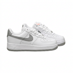 White and grey Nike Air Force 1 sneaker pair, angled view on white background