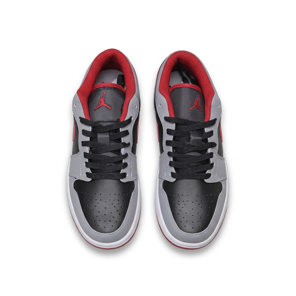 Air Jordan 1 Low sneakers with black laces and red lining, top view on white background