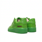 Bright green Nike Air Force 1 sneakers with Nike Air heel branding, rear angled view on white background