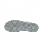 Grey Nike sneaker outsole on white background