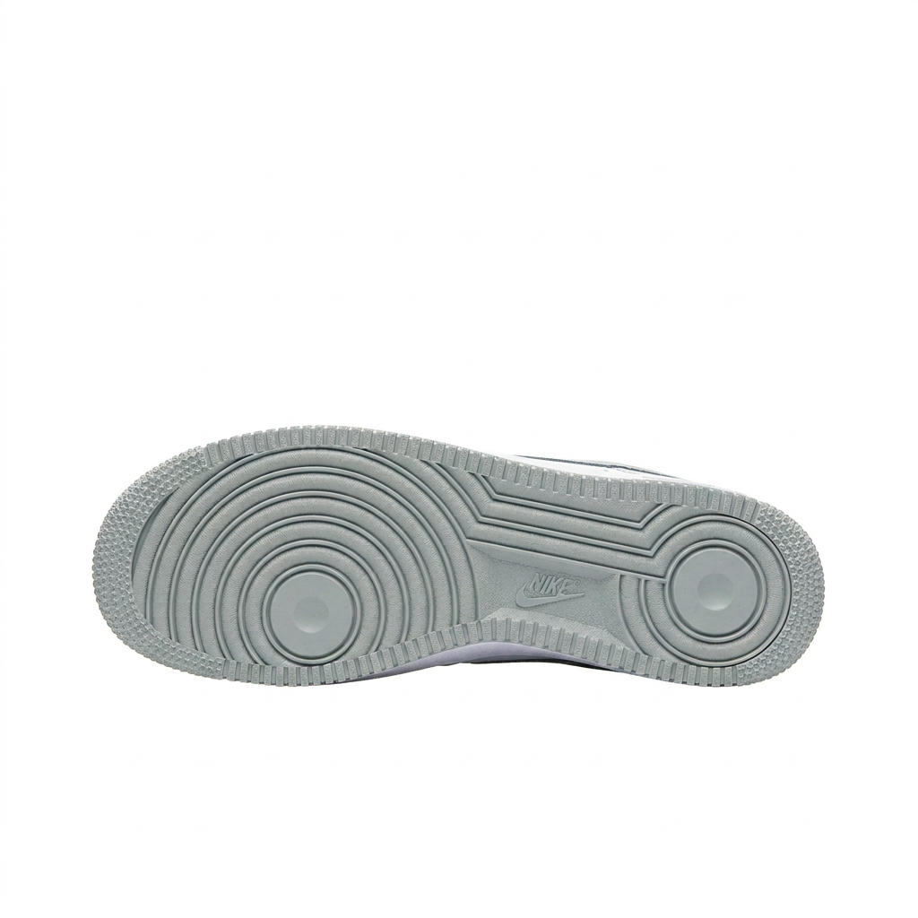 Grey Nike sneaker outsole on white background