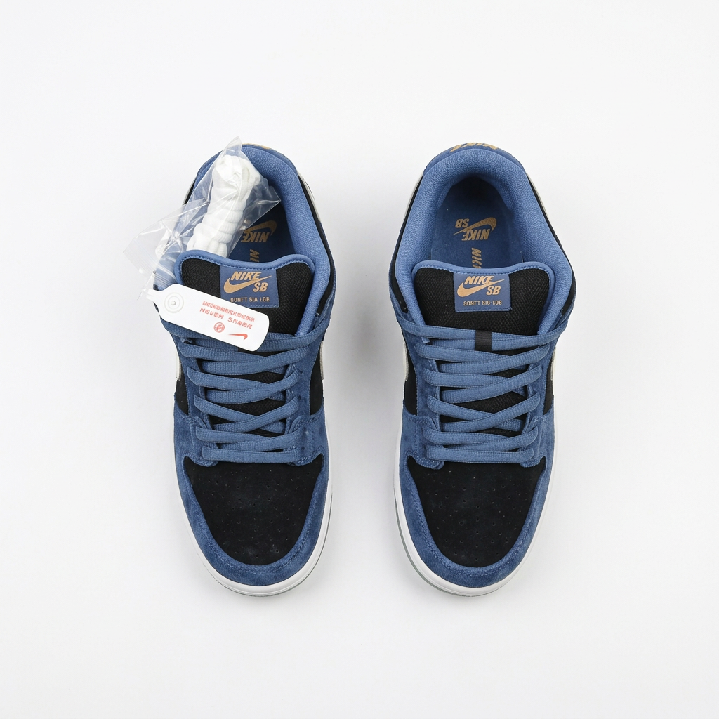 Top view of the Nike navy blue and black suede low-top sneakers