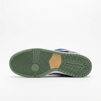 Grey outsole of the Nike navy blue and black suede low-top sneaker