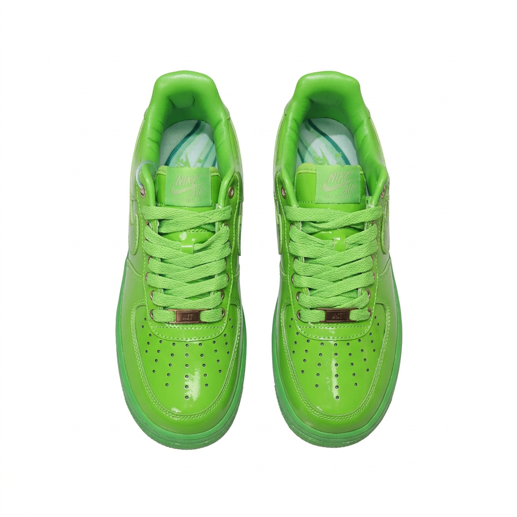 Glossy green Nike Air Force 1 sneakers with matching laces, overhead view on white background