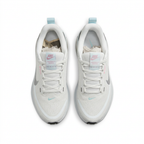 White and ice-blue Nike sneakers, top view on white background
