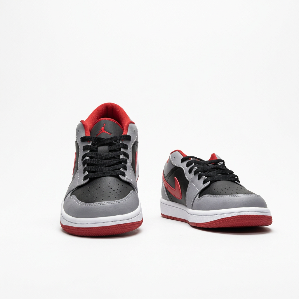 Black grey and red Air Jordan 1 Low sneakers, front view on white background