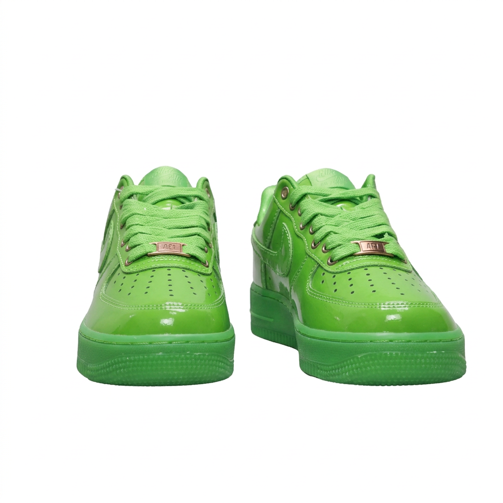 Glossy green Nike Air Force 1 sneakers with metallic lace tags, front view on white background