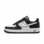 Black and white Nike Air Force 1 low-top sneaker with toe pointing left on a white background.
