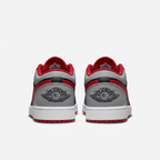 Air Jordan 1 Low sneakers with Wings heel logos, rear view on white background