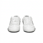 Front view of white Nike low-top sneakers with white laces and black outsole accents on white.