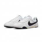Pair of white Nike sneakers with large black Swoosh details and cream-toned midsoles on white.