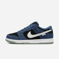 Nike low-top sneaker in navy blue and black suede, side view