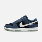 Nike low-top sneaker in navy blue and black suede, side view