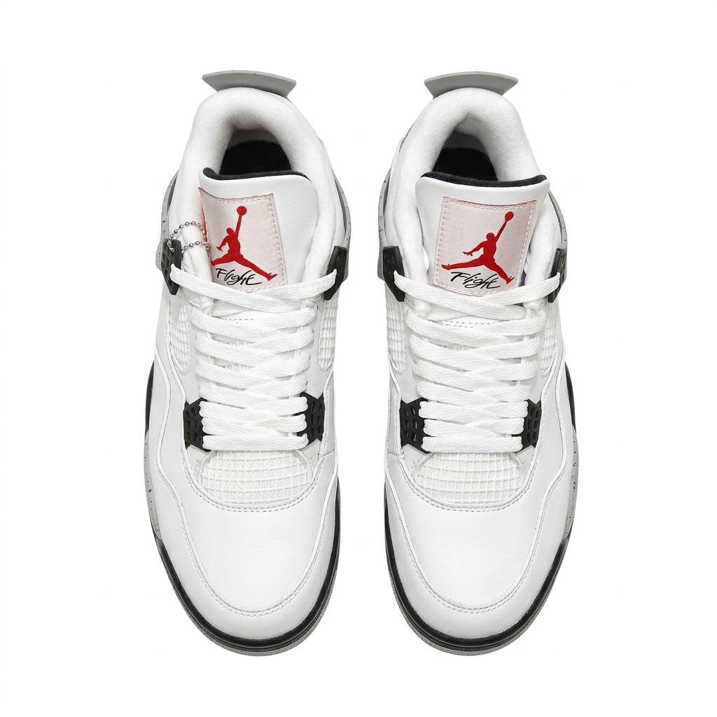 White Air Jordan 4 sneakers with black lace tabs, overhead view on white background