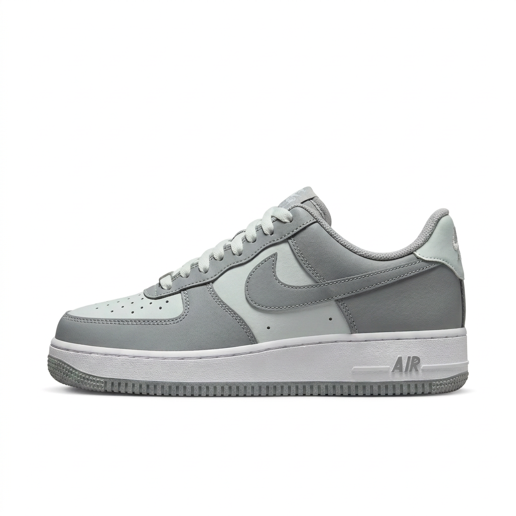 Grey and white Nike sneaker, side view on white background
