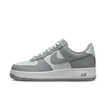 Grey and white Nike sneaker, side view on white background