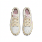 Cream and white sneakers with pink tongue details, top view on white