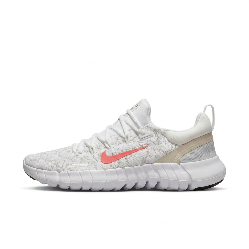 White Nike low-top sneaker with pink Swoosh, side view on white background