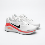 White Nike sneakers with black Swooshes and coral-red details, angled view on white