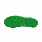 Bright green Nike Air Force 1 outsole with circular tread on white background