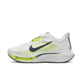 Left-facing white Nike sneaker with neon lime accents, black Swoosh and sculpted white midsole on white.