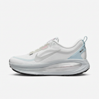 White Nike sneaker with ice-blue heel accents, side view on white background